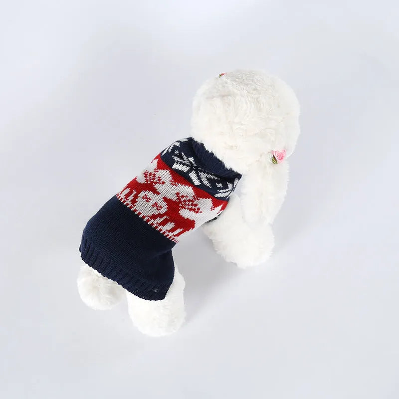 Navy blue knitted Christmas sweater for a dog on a white background