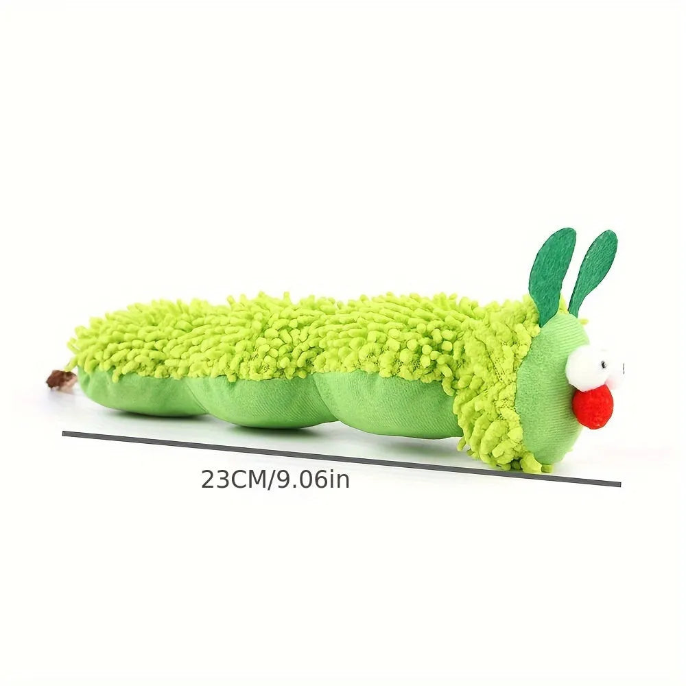 Green interactive plush cat toy with sports accessories showing 24cm length dimensions