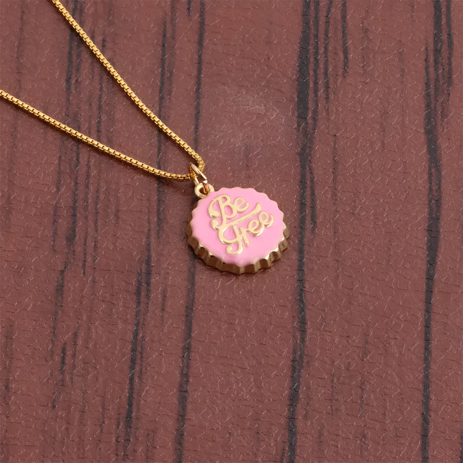 Copper bottle cap pendant necklace on a 40cm box chain with 18K gold electroplated finish