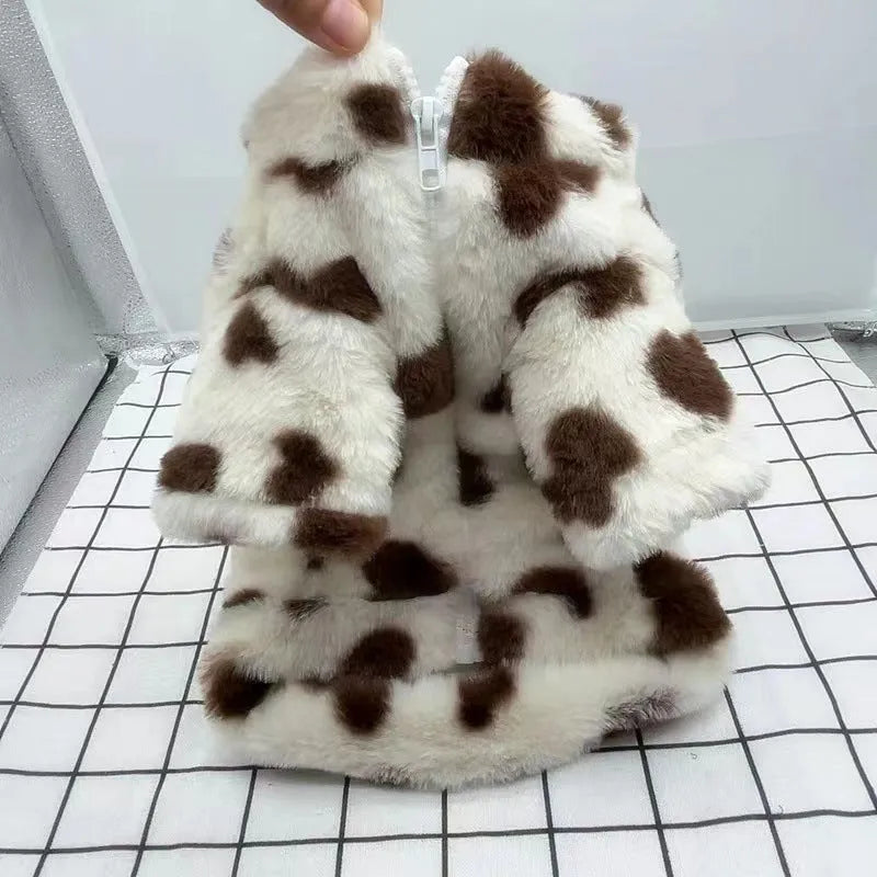British style pink polyester warm coat on a small white dog, showing the fit and traditional design.
