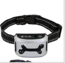 Black digital dog bark training collar with adjustable reflective strap on a table