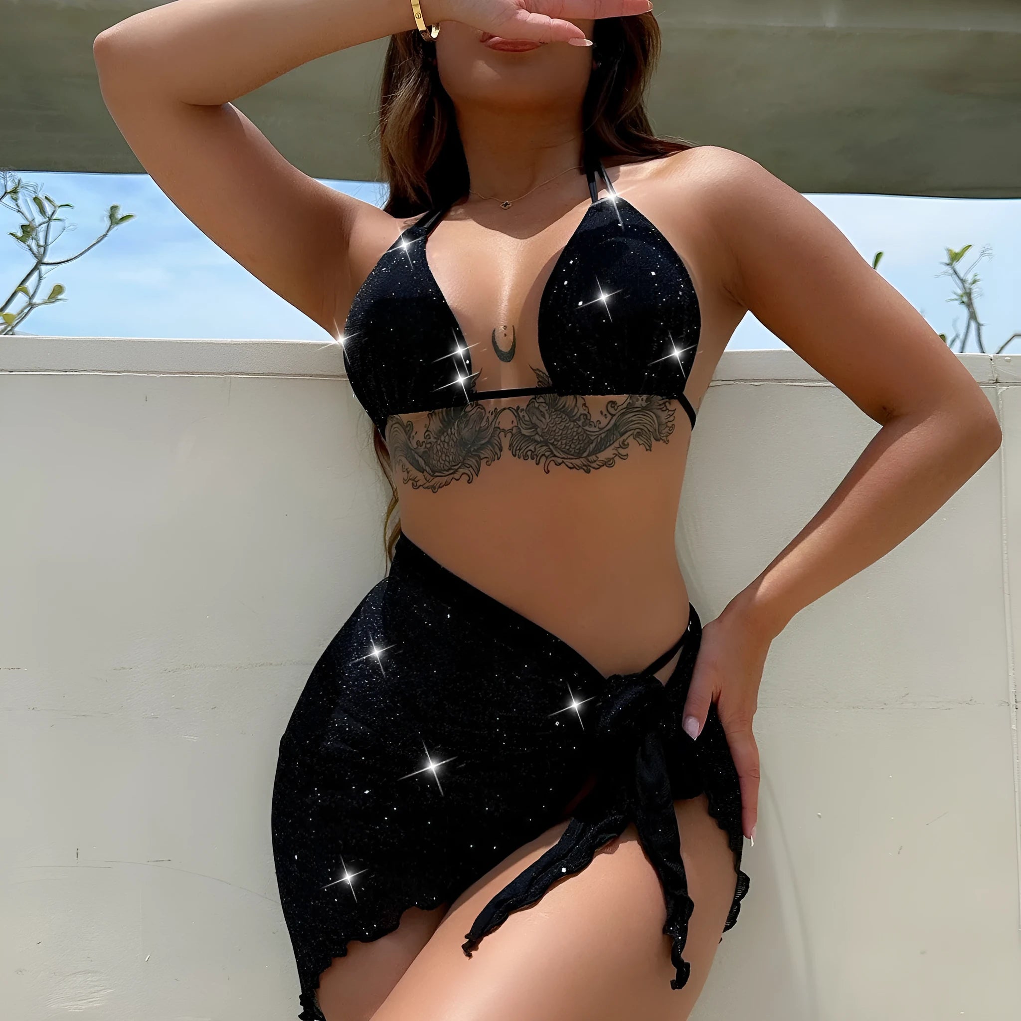 Black three piece bikini swimsuit set with separated top and shorts