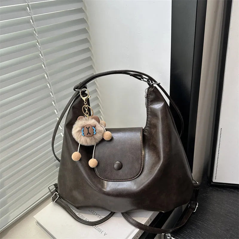 Women's PU leather shoulder bag in horizontal square shape with single strap and mobile phone compartment