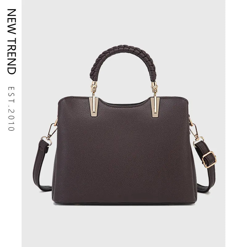 PU ladies handbag 25x12x19cm with single shoulder strap, zip pockets and contrast stitching