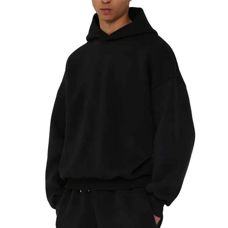 Men's grey fleece-lined cotton pullover hoodie with a wool lining and threaded long sleeves.