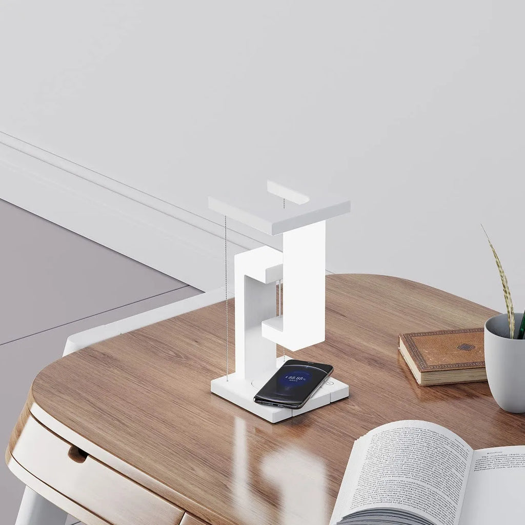 White magnetic suspension table lamp with wireless charging, touch switch, USB power, 12 x 12 x 22 cm, floating light design.