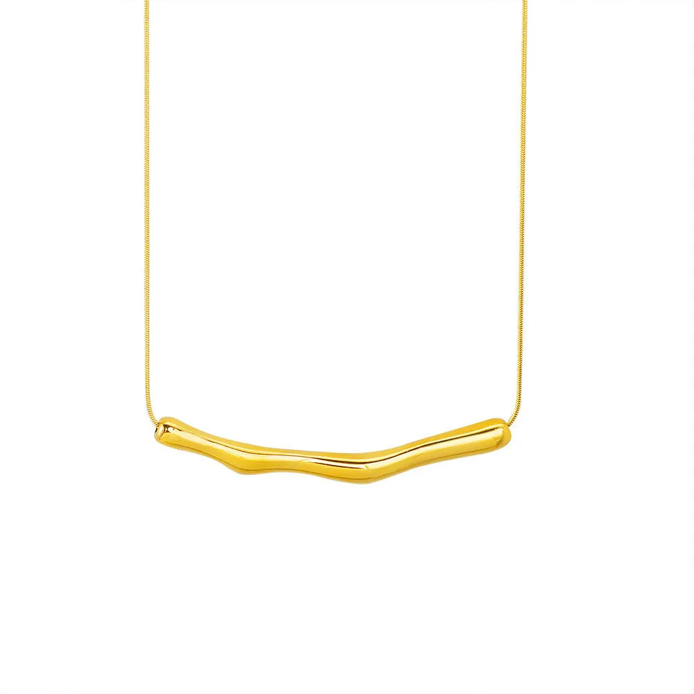Close-up of a women's pleated titanium steel necklace in gold colour showing its textured folded design.