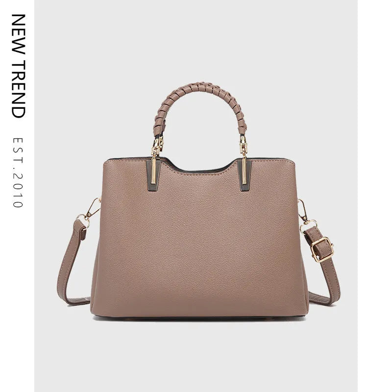 PU ladies handbag 25x12x19cm with single shoulder strap, zip pockets and contrast stitching