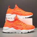 Men's low top casual shoes with mesh upper, cross shoulder straps, and round toe in fluorescent colour options