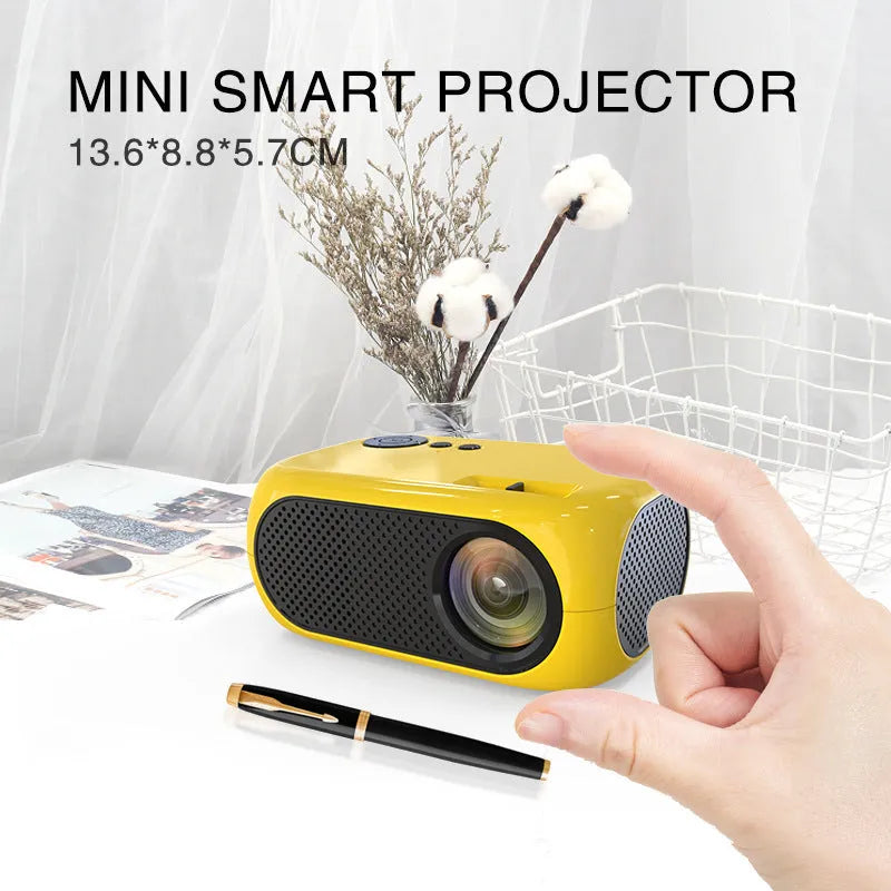 M24 micro mini projector in gold or white ABS plastic with power adapter and cables