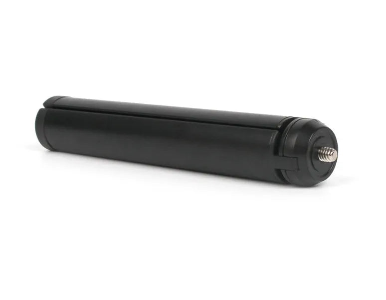 Black aluminium mobile phone tripod stabilizer with PTZ functionality on a table