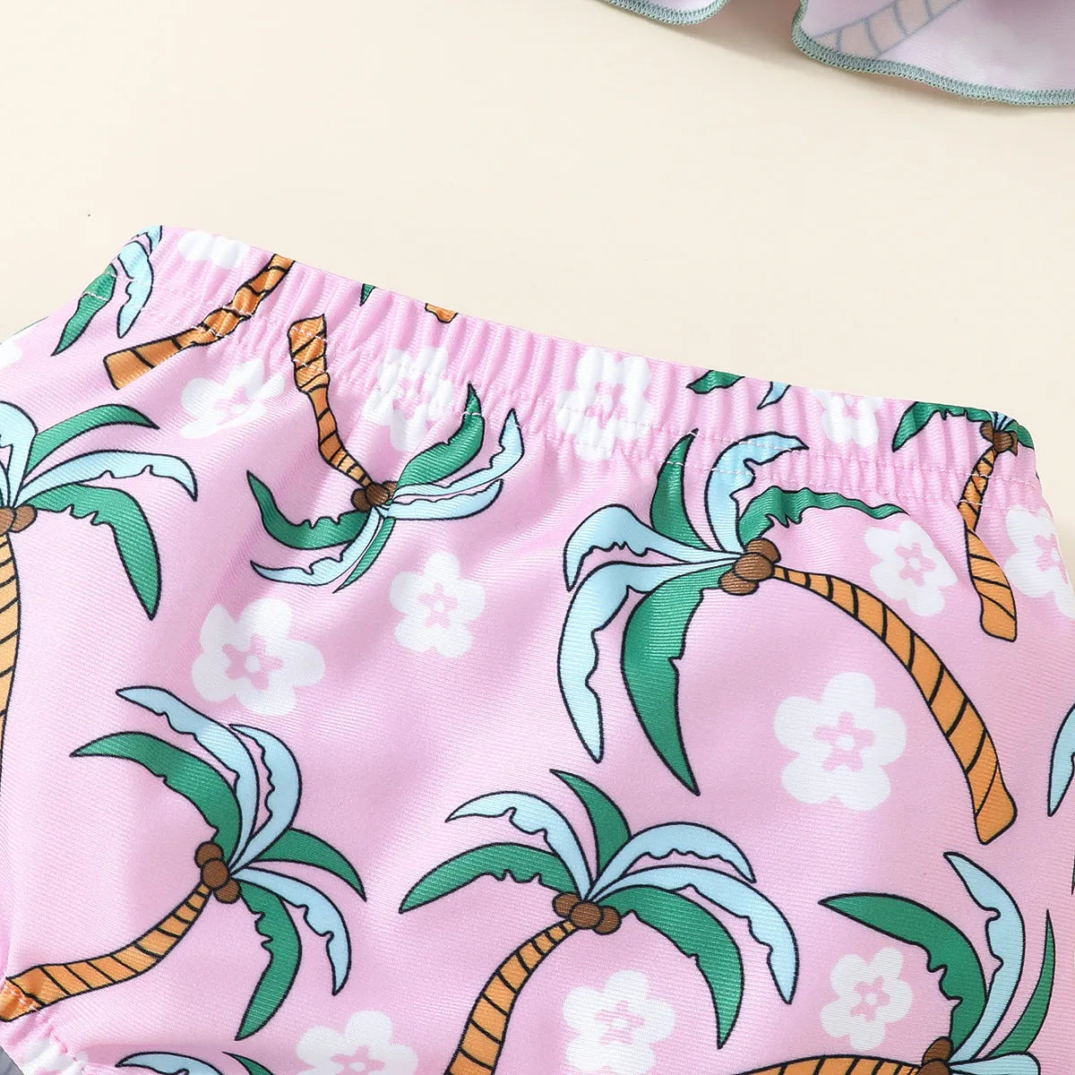 White children's swimsuit two-piece set with top and shorts for beach and pool wear