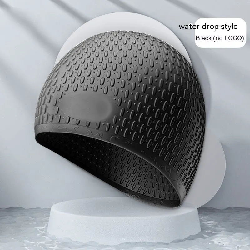 Silicone water drop style swimming cap for adults in various solid colours