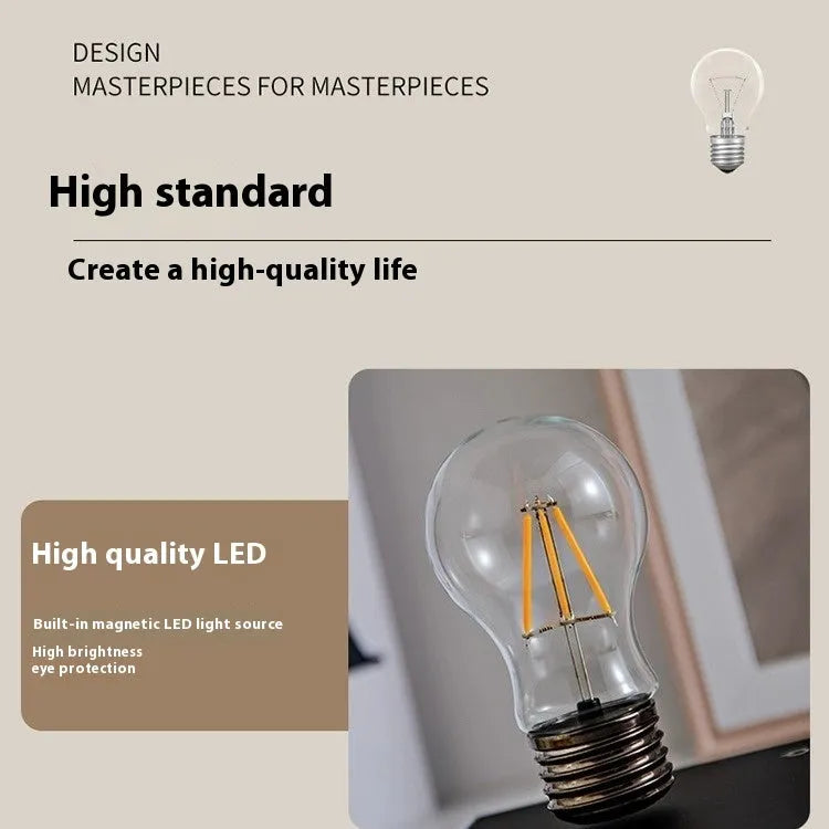 Iron art suspension bulb night lamp with black wood grain square base on desktop