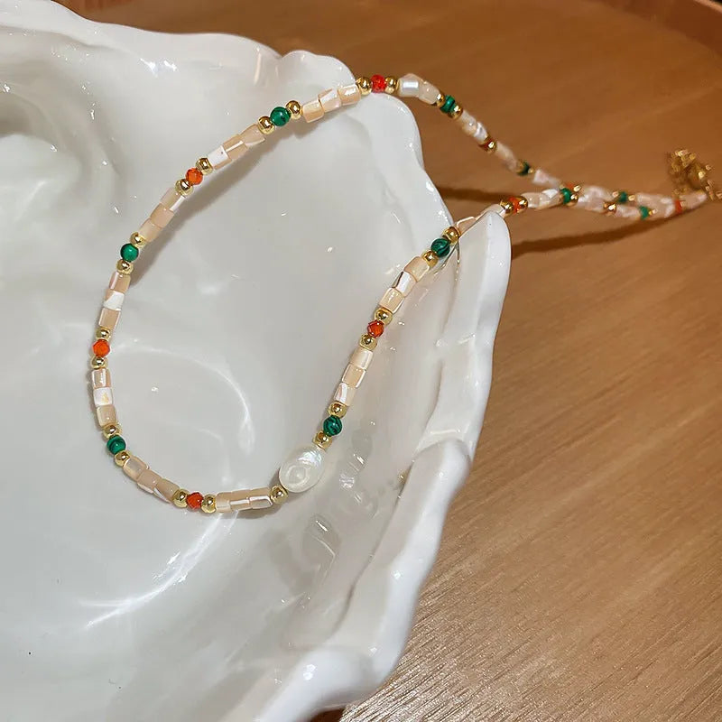 Women's pearl necklace with geometric pendant on a 41-50cm zinc alloy clavicle chain, available in freshwater pearl and apricot shell options