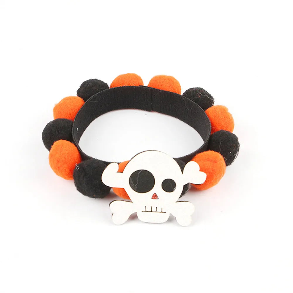 Halloween pet collar with decorative fur ball in pumpkin, bow, skull, and witch designs
