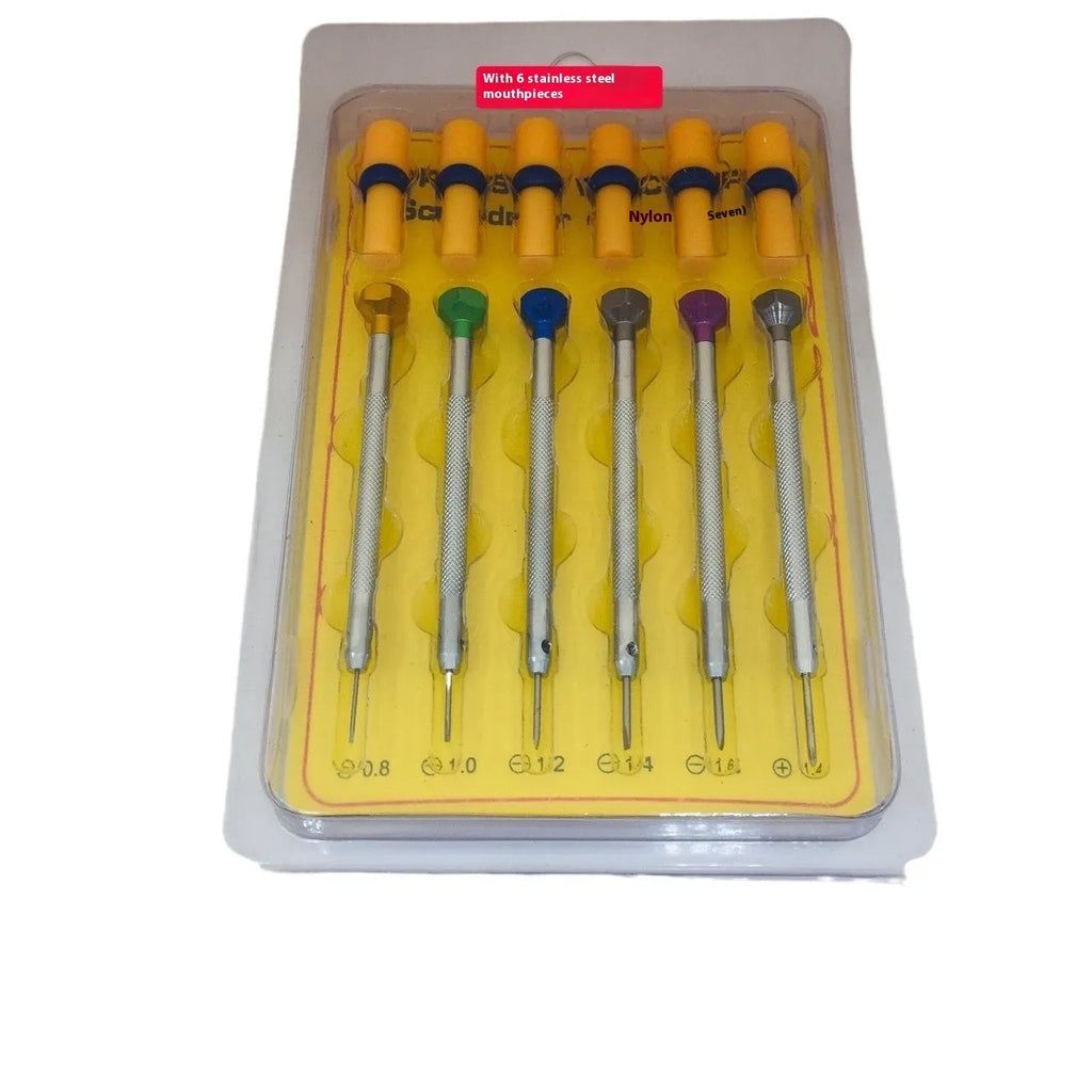 Six colour-coded watch repair screwdrivers with aluminium handles laid out on a surface.