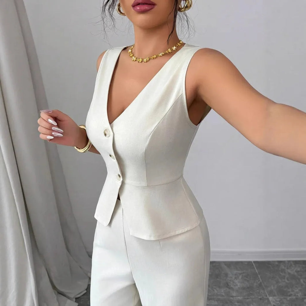 Women's solid colour sleeveless vest and high waist trousers two-piece set in a casual style.