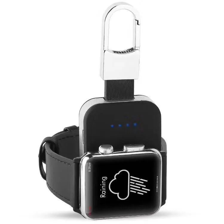 Black keychain-sized wireless power bank for Apple Watch showing front view and size relative to a keyring.