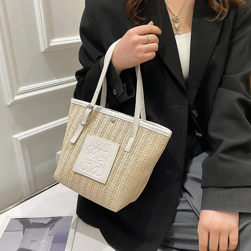Women's woven straw shoulder bag in European retro style with three-dimensional pockets
