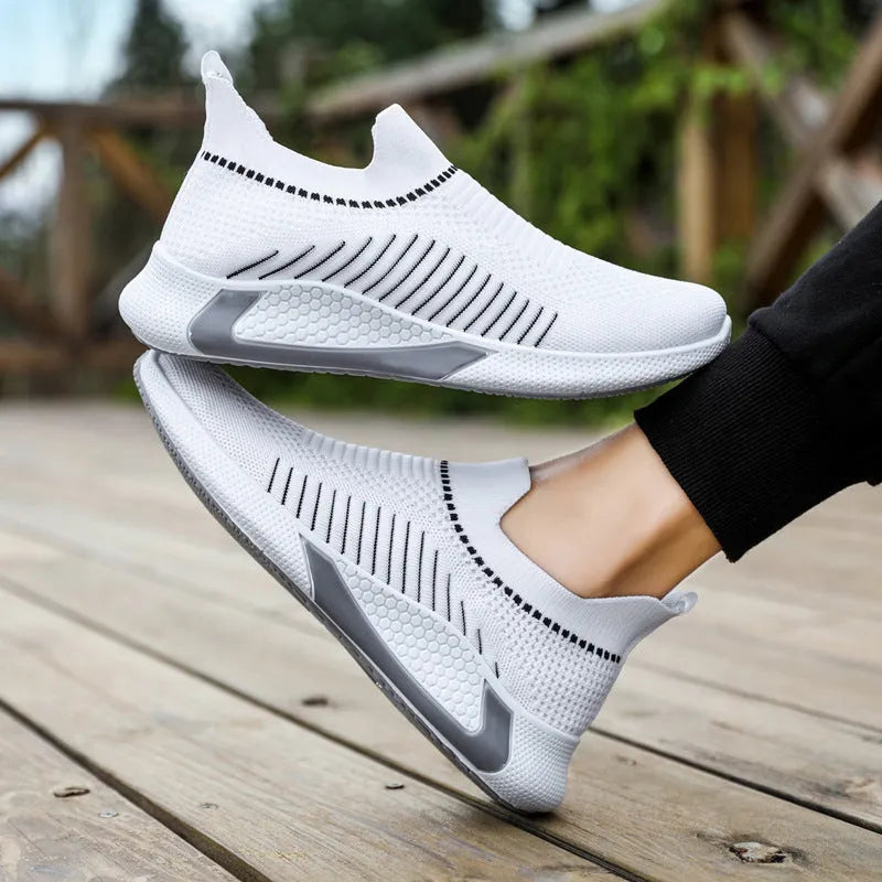 Men's flyknit mesh sneakers with striped design and plastic sole in black and white