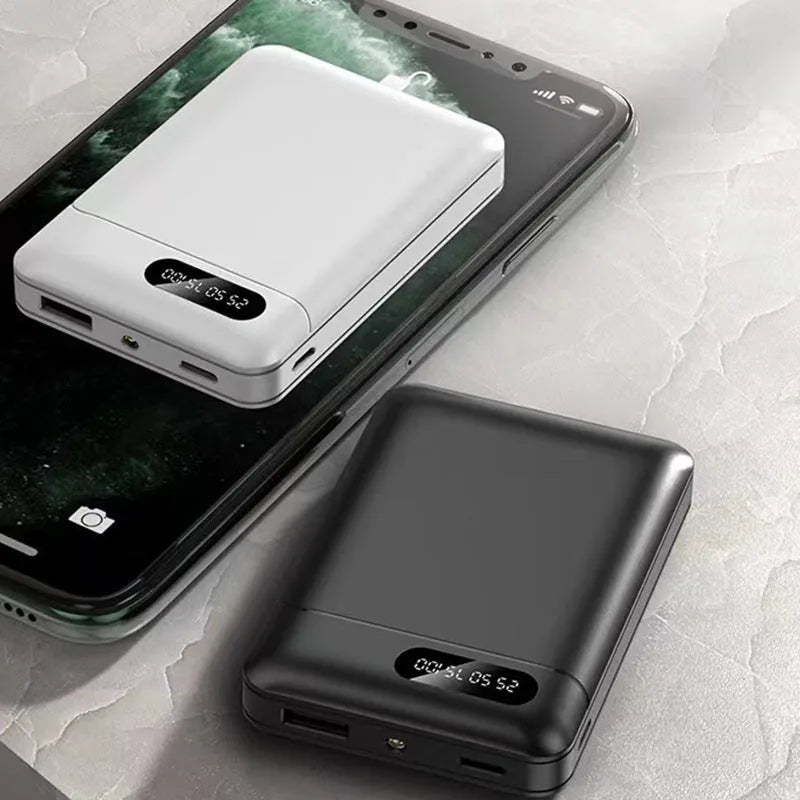 Black and white portable power bank with dual USB ports showing capacity options from 4000mAh to 10000mAh
