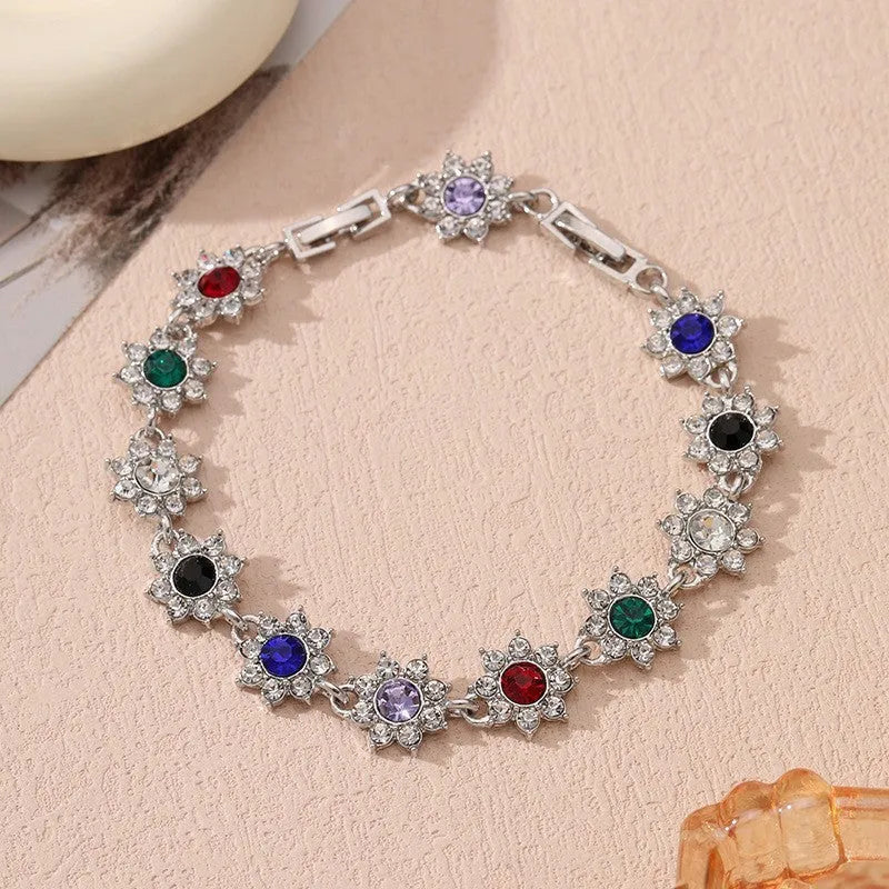 Flower charm bracelet in zinc alloy with electroplated finish and colourful crystal accents