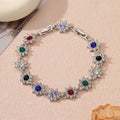 Flower charm bracelet in zinc alloy with electroplated finish and colourful crystal accents
