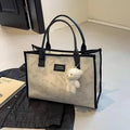 Women's printed canvas tote bag with rhombus pattern in black or white colours
