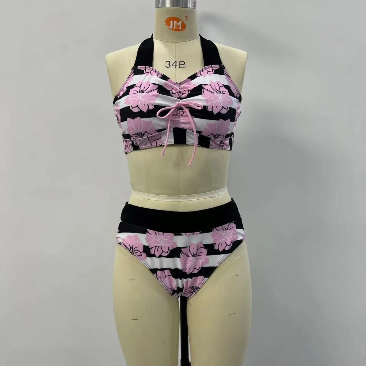 Black women's high-waisted bikini with a slimming belly-covered brief and split top.
