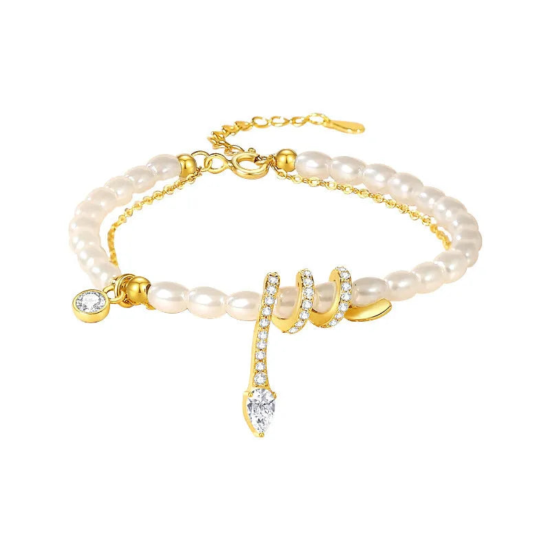 Pearl Snake 925 silver bracelet with snake charm, available in gold or white gold electroplated finish.
