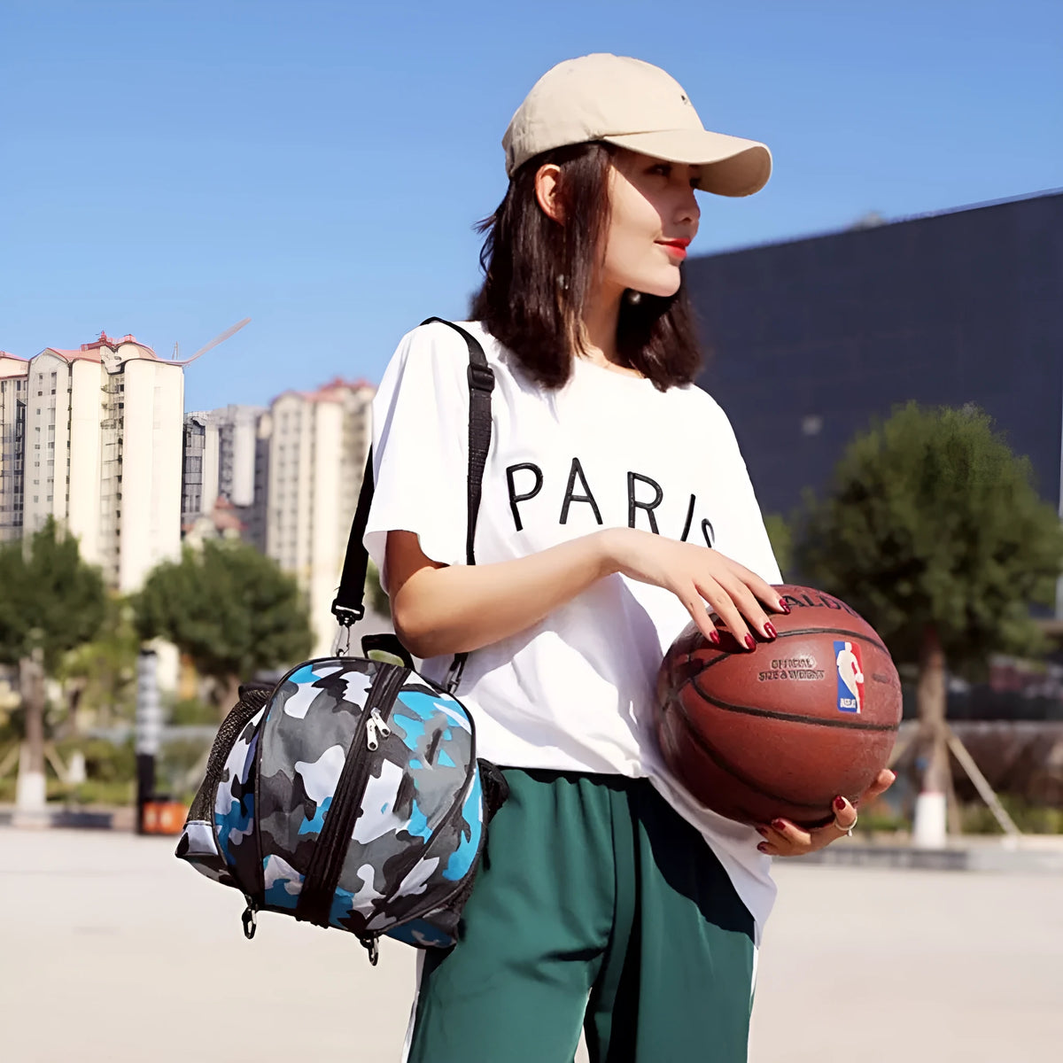Oxford cloth basketball bag with 9L capacity shown in a colour option, featuring either one or two shoulder straps.