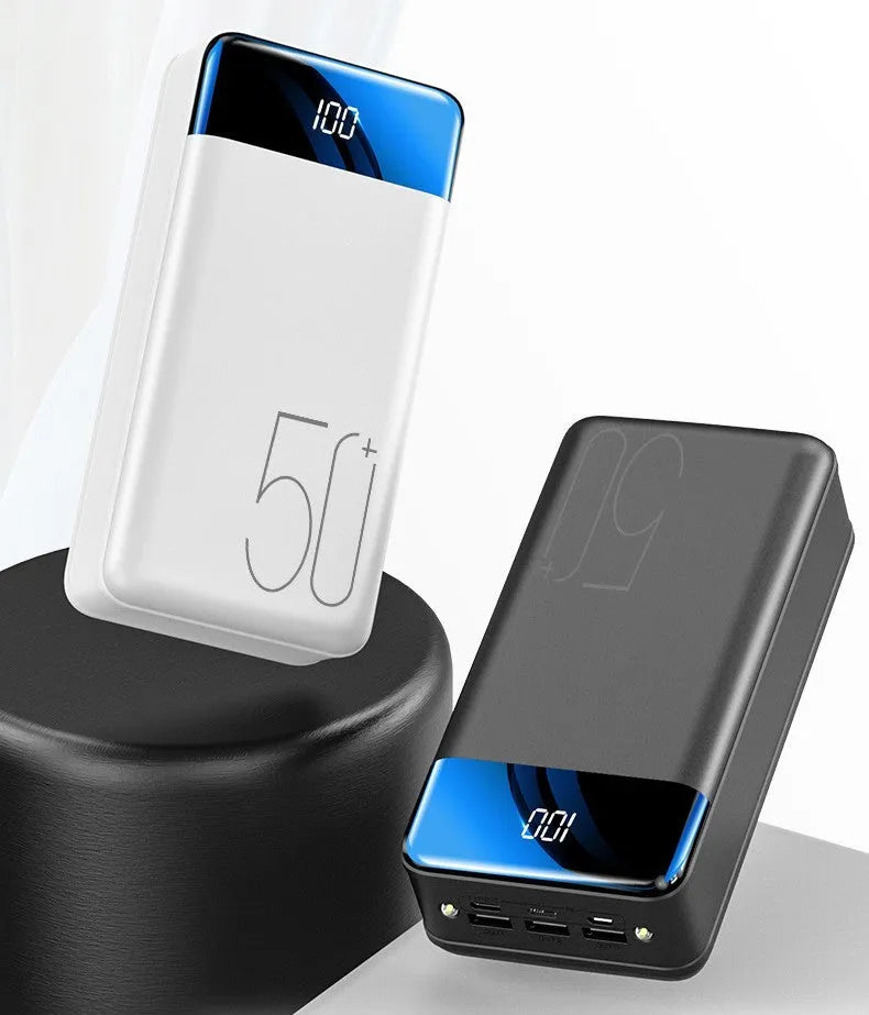 Black or white 50000 mAh power bank with three output ports measuring 169 x 83 x 52 mm