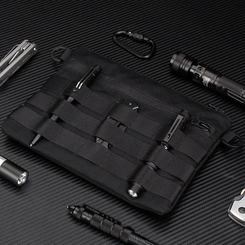 Black Oxford cloth portable outdoor organiser kit measuring 18cm by 3.5cm