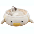 Green dinosaur-shaped cat bed shown both flat as a sofa and hanging as a hammock for small pets.