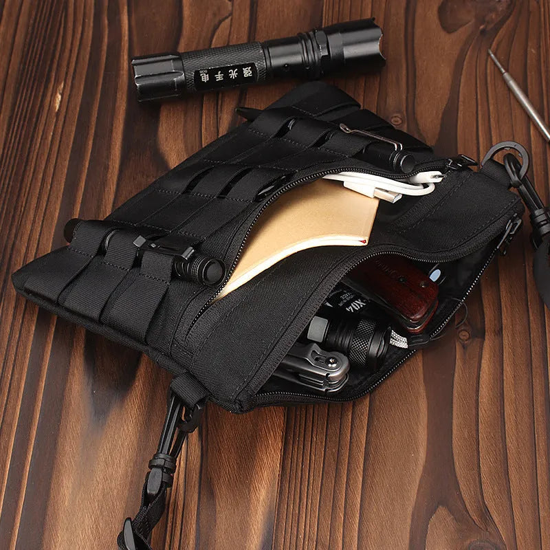 Black Oxford cloth portable outdoor organiser kit measuring 18cm by 3.5cm