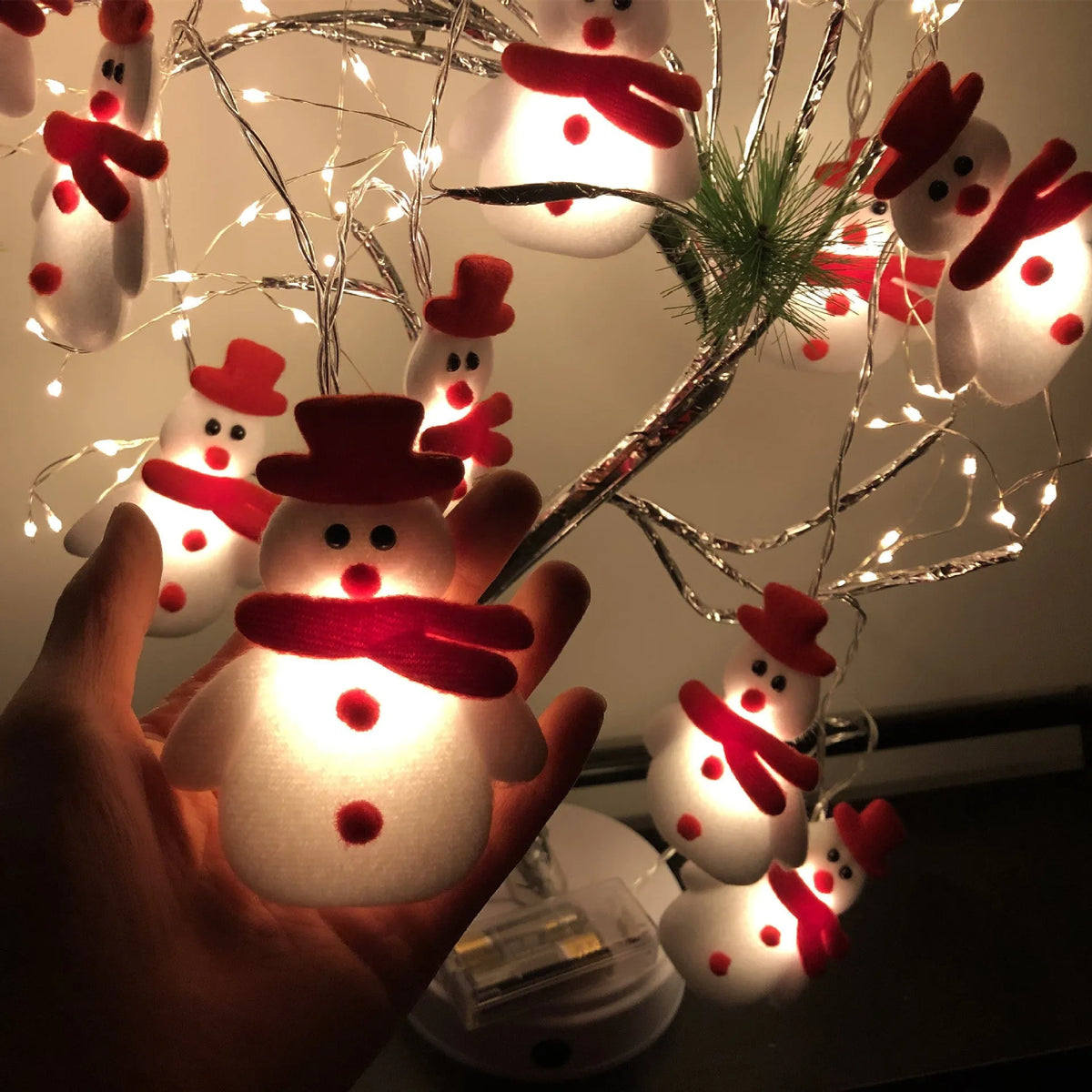 Snowman and elk deer LED Christmas string lights garland in warm white, with remote control.