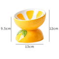 Ceramic raised cat bowl with tilted wide rim design in orange pattern for indoor cats