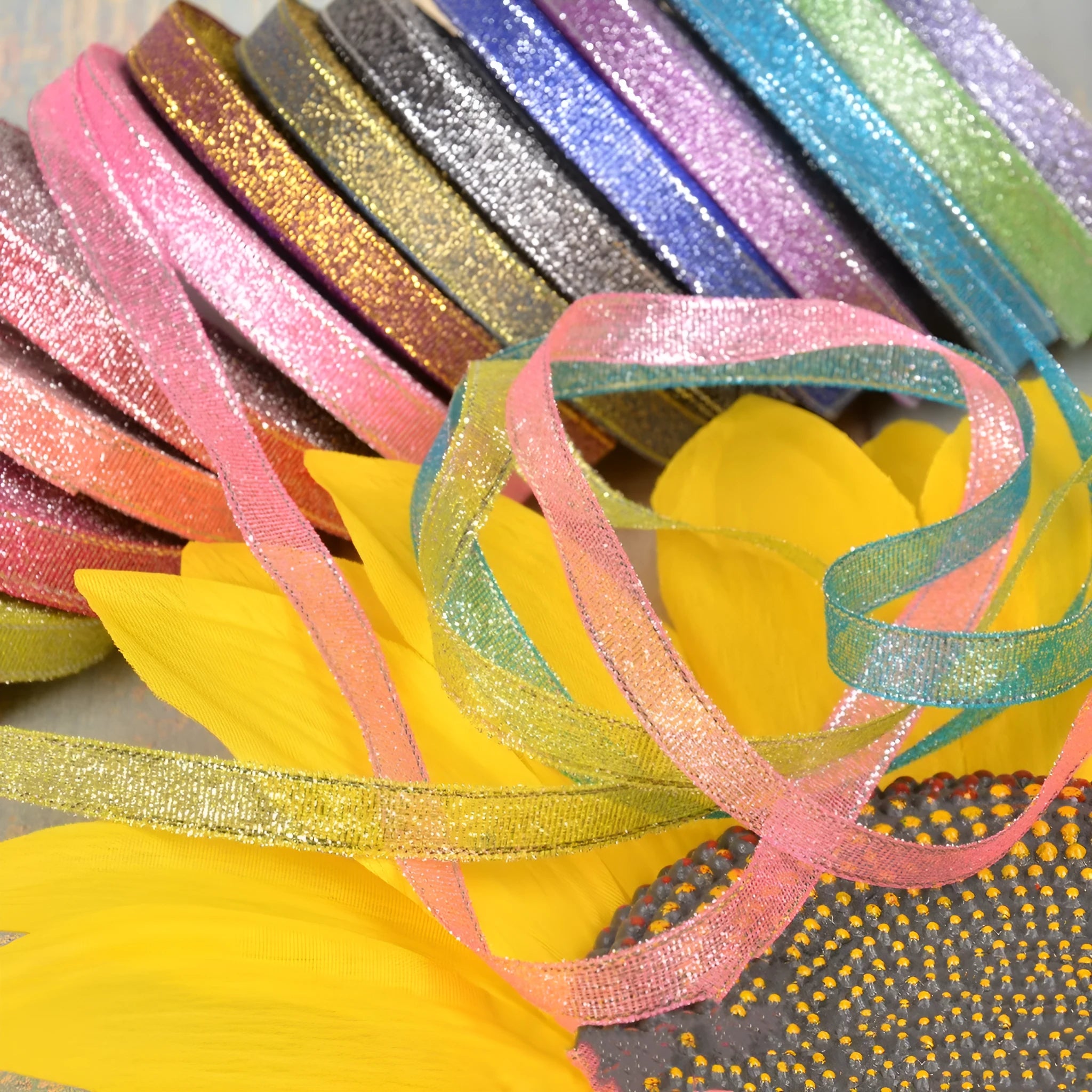 Green onion pattern polyester ribbon spool in metallic silver finish showing 3-point width measurement