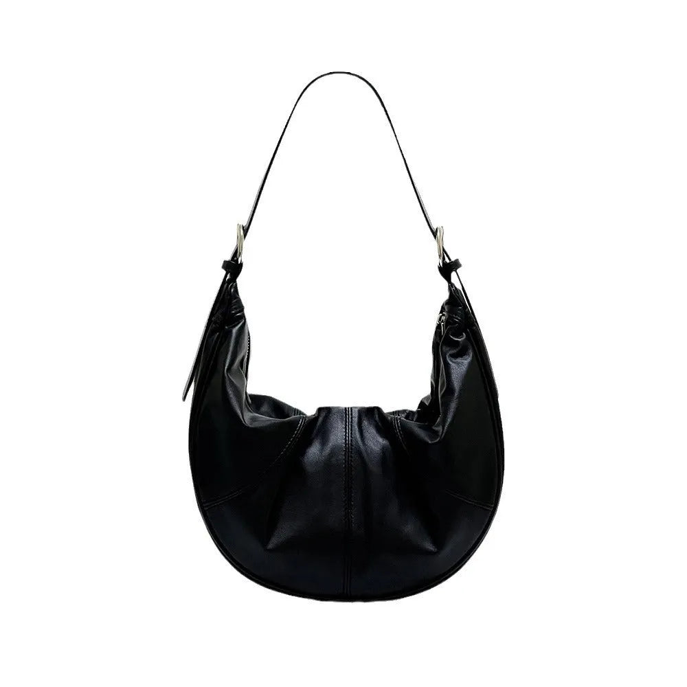 First layer cowhide shoulder bag in dumpling shape with double joint strap and sandwich pocket available in multiple colours