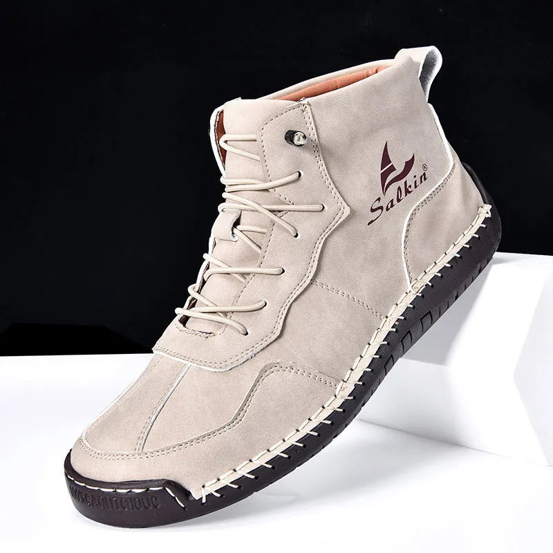 Retro high-top boots with frosted finish, round toe, and elastic band entry