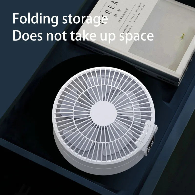 White portable folding fan with remote control shown in desktop and wall-mounted positions