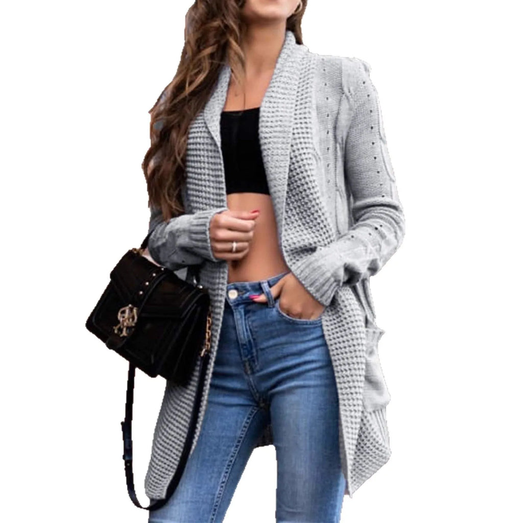 Grey loose-fit women's cardigan sweater coat with pockets, shown on a hanger.