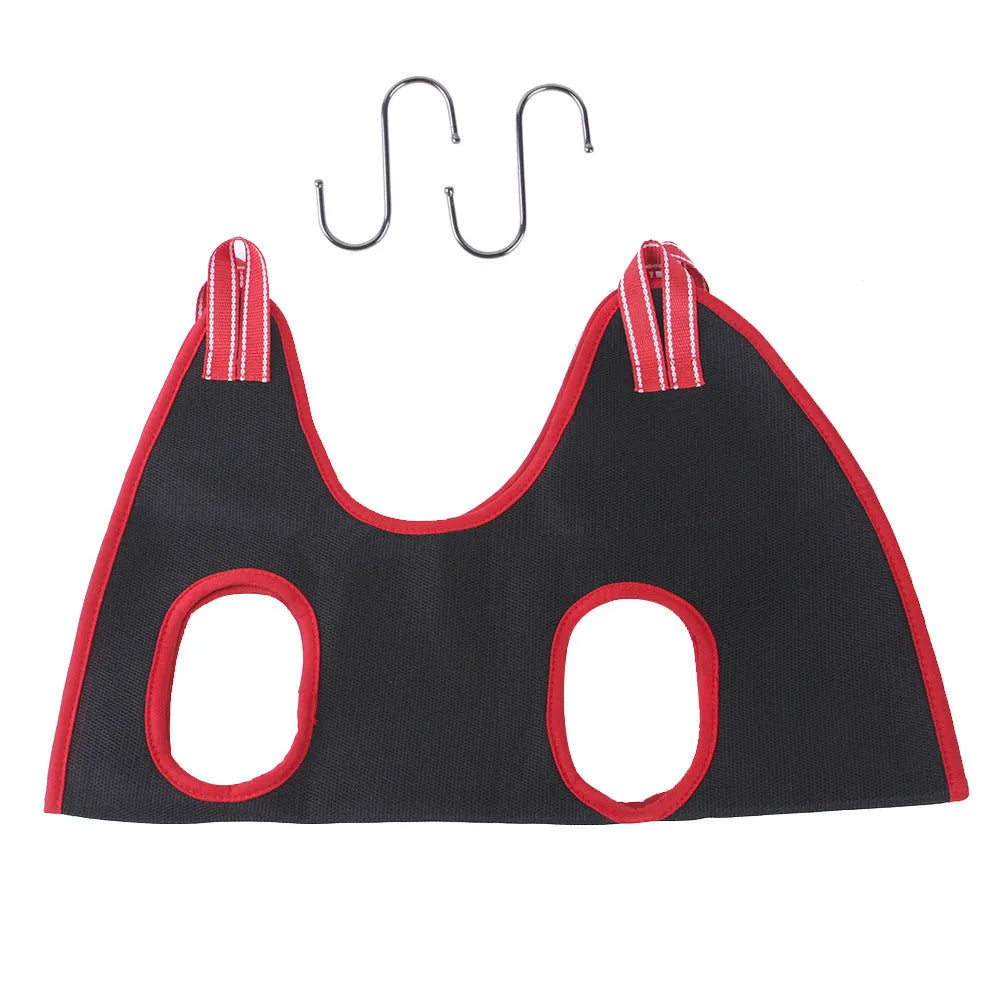 Pet grooming hammock restraint bag in use for dog nail trimming procedure