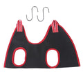 Pet grooming hammock restraint bag in use for dog nail trimming procedure
