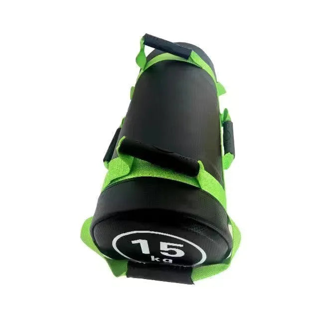 Flat white leather PVC fitness training sandbag shown in a gym setting for weight lifting and conditioning.