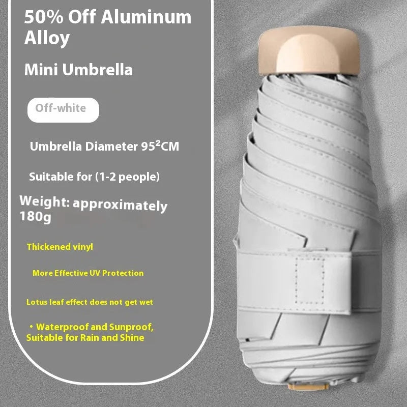 Closed five-fold manual umbrella with a gradient vinyl sunshade, showing the six-alloy-bone frame and one of eight colour options.