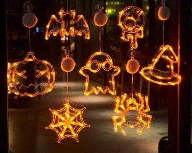 Halloween window hanging LED lights set with spider, pumpkin and ghost designs using battery power