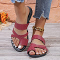 Casual round head beach slippers with a hollow out PU upper and leather lining.