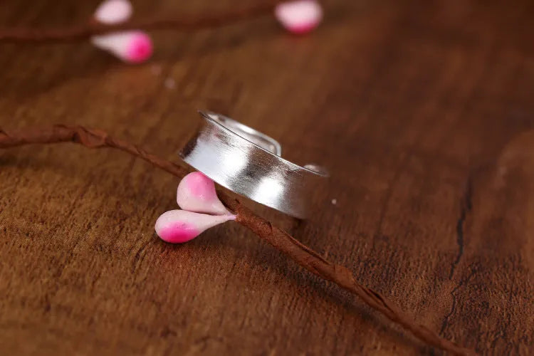 Open ring sterling silver with frosted finish and adjustable opening, geometry ornament